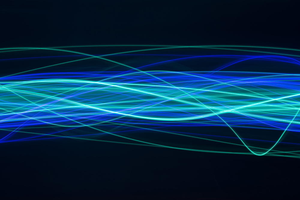 blue pattern of overlapping waves / www.freeimages.co.uk - see http://www.freeimages.co.uk/terms.htm for license details, www.freeimages.co.uk a complicated waveform pattern created from cyan and blue random and overlapping waves of light